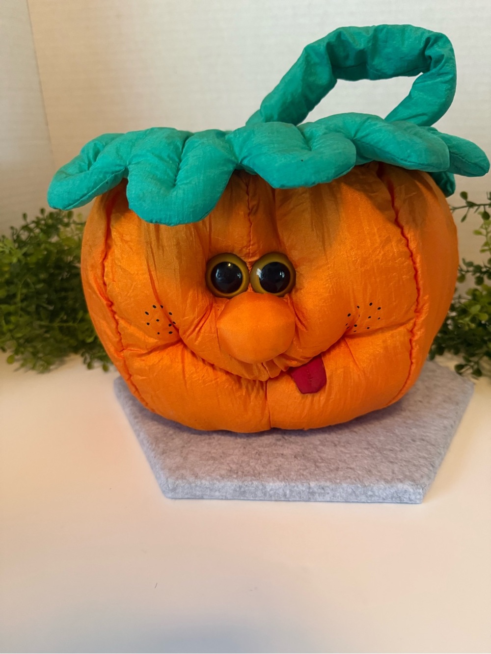 Plush pumpkin trick-or-treat basket